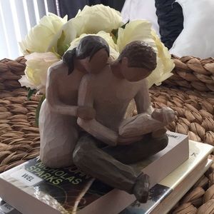 Couple and baby statue